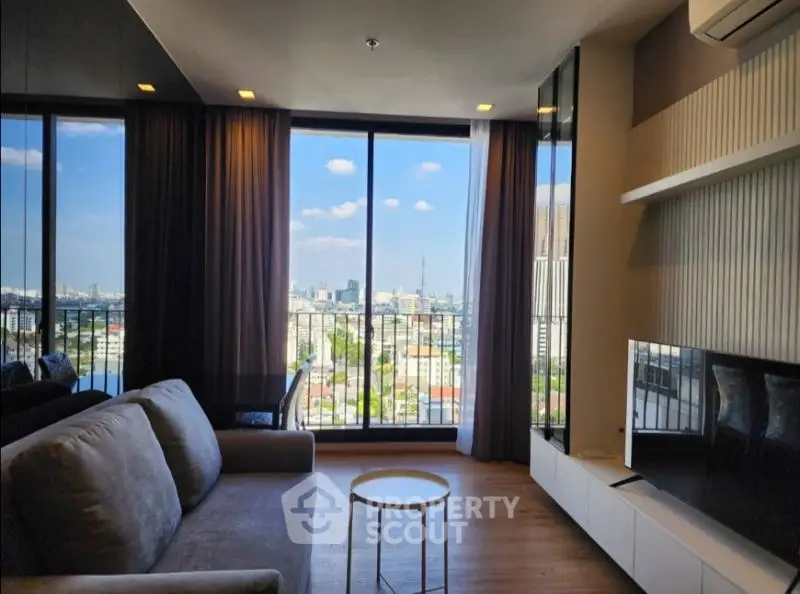 Modern living room with stunning city view and elegant decor