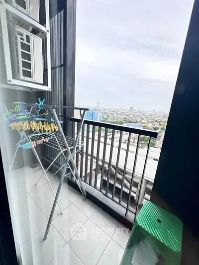 Charming balcony with city view, perfect for relaxation and enjoying the skyline.