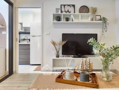 Modern living room with stylish decor and open kitchen view