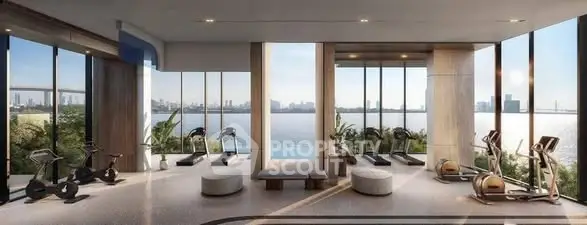 Luxurious gym with panoramic city and river views, featuring modern equipment and elegant design.