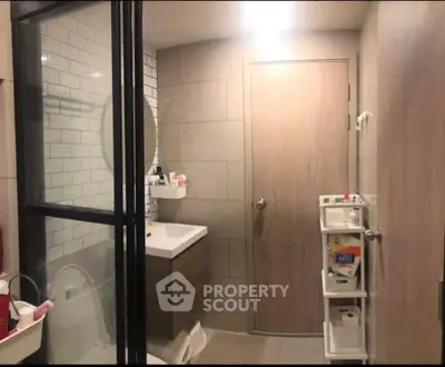 Modern bathroom with sleek design and ample storage space