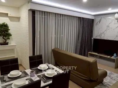 Modern living room with elegant dining area and stylish decor