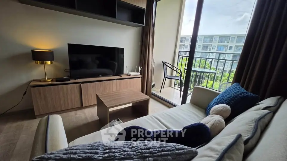 Modern living room with balcony view in stylish apartment