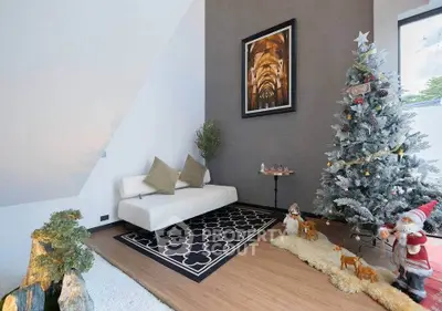 Cozy living room with festive Christmas decor and elegant furnishings