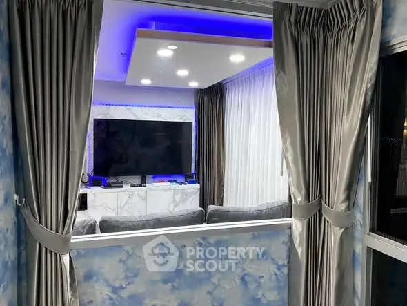 Luxurious living room with modern decor and ambient lighting