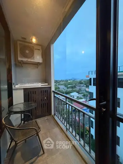 Charming balcony with stunning city view, perfect for relaxation and enjoying the skyline.