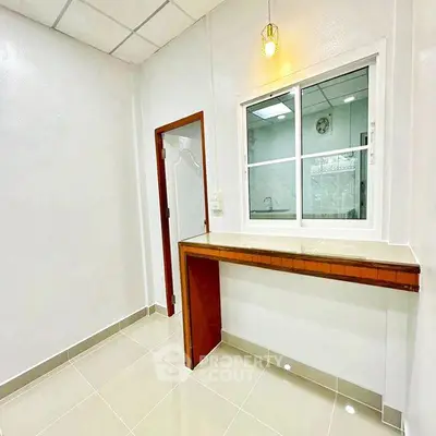 Modern kitchen with open layout and sleek countertops