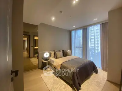 Luxurious modern bedroom with floor-to-ceiling windows and elegant decor