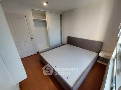 Spacious bedroom with modern design and ample closet space