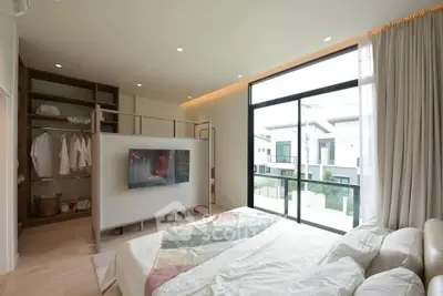 Luxurious bedroom with modern design and large window view