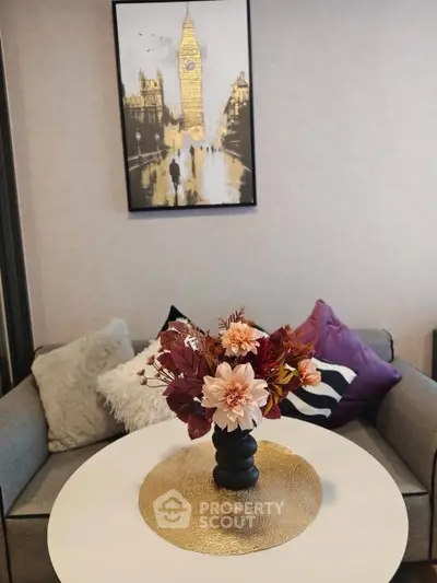 Stylish living room with elegant decor and cozy seating area, perfect for relaxation.