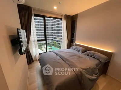 Modern bedroom with pool view in luxury apartment