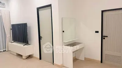 Modern interior with sleek TV setup and minimalist design