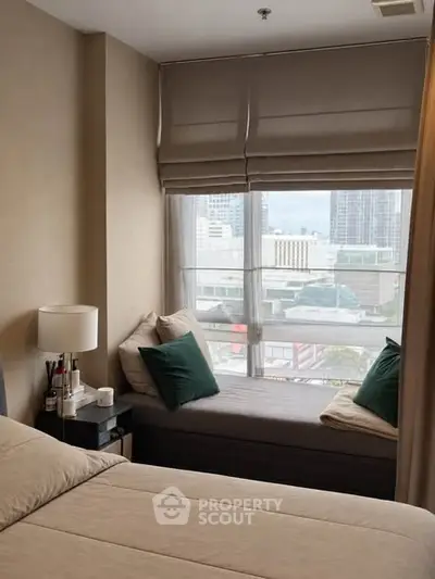 Cozy bedroom with city view and elegant decor
