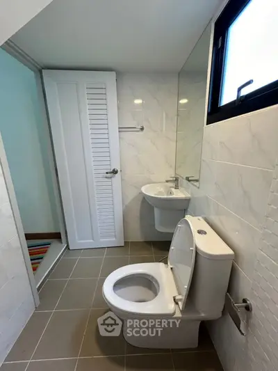 Modern bathroom with sleek fixtures and natural light