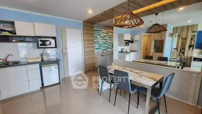 Modern kitchen with open layout and stylish dining area