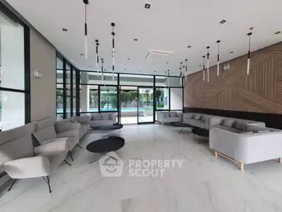 Modern living room with stylish furniture and elegant lighting