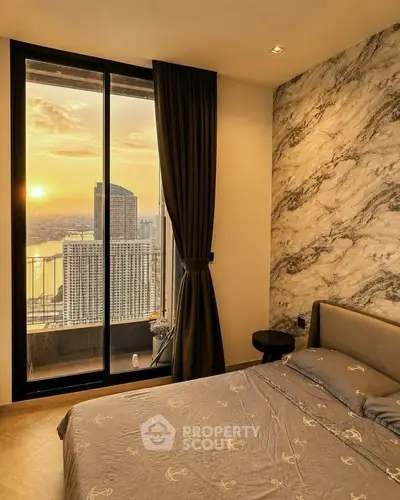 Luxurious bedroom with stunning city view and elegant decor