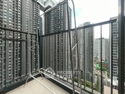 High-rise balcony with stunning cityscape view of modern skyscrapers.