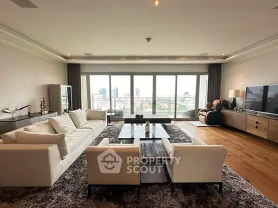 Luxurious living room with panoramic city view and elegant furnishings