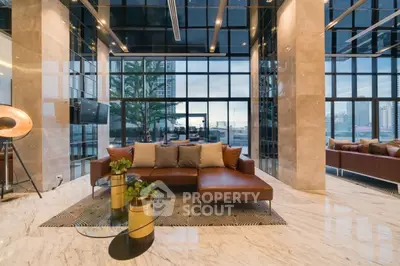 Luxurious modern living room with floor-to-ceiling windows and elegant decor