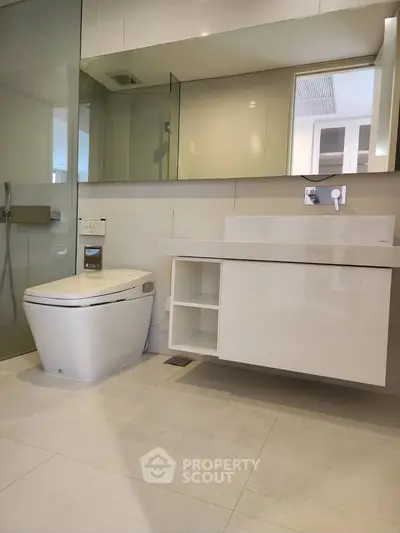 Modern bathroom with sleek fixtures and spacious design