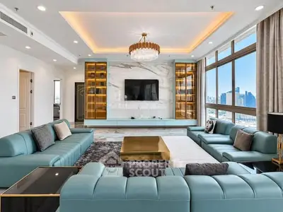 Luxurious living room with panoramic city views, elegant lighting, and modern furnishings.