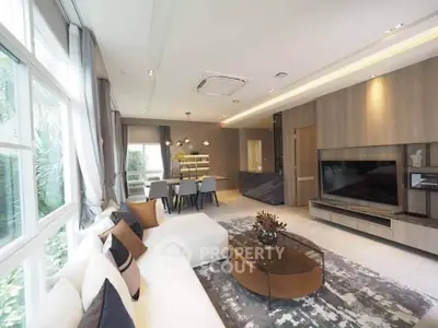 Luxurious modern living room with elegant decor and spacious open layout, perfect for stylish living.