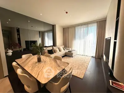 Luxurious modern living room with elegant dining area and large windows