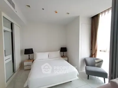 Modern bedroom with cozy bed and stylish decor in bright apartment