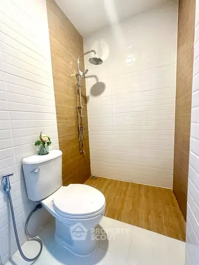 Modern bathroom with sleek shower and elegant tile design