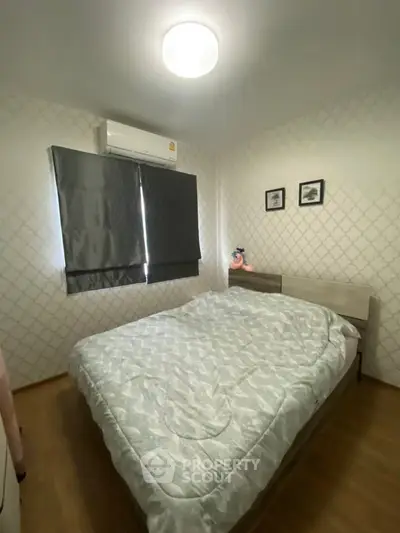 Cozy bedroom with modern decor and natural light