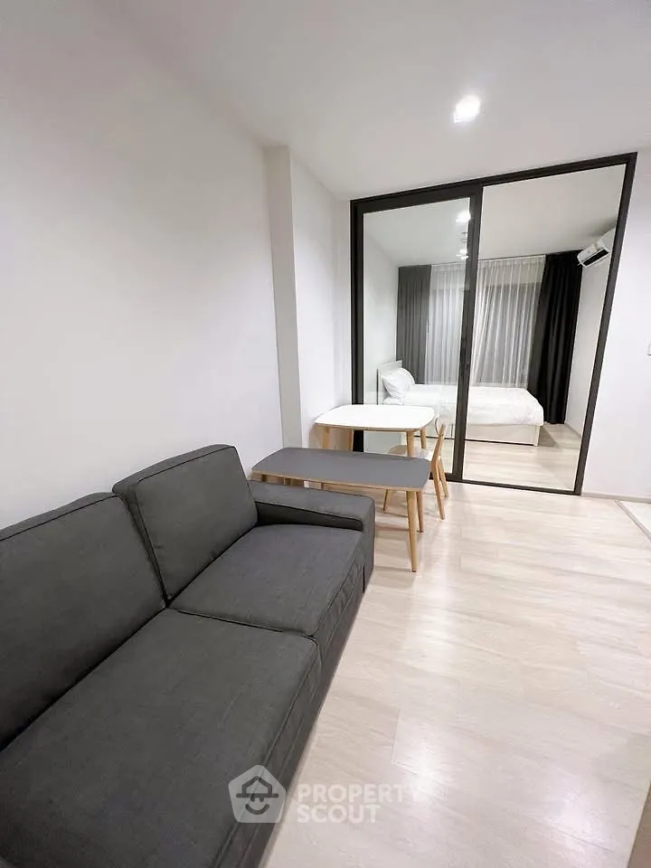 Modern studio apartment with sleek design and cozy furnishings
