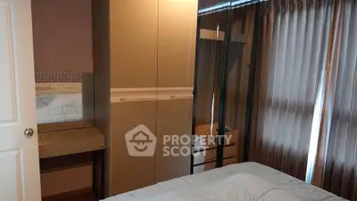 Cozy bedroom with modern wardrobe and soft lighting