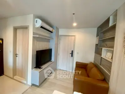 Modern living room with sleek design, featuring a leather sofa, wall-mounted TV, and stylish shelving.