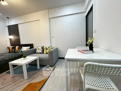 Modern living room with stylish decor and cozy seating area