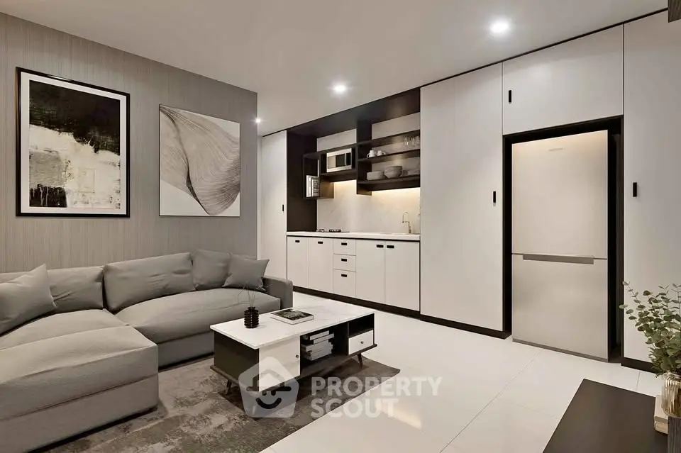 Modern living room with sleek kitchen and stylish decor