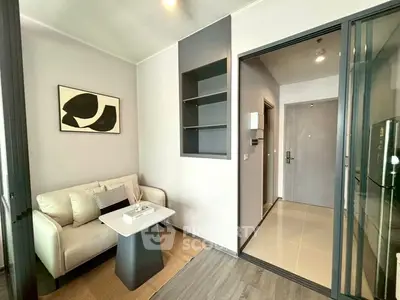Modern living room with stylish decor and open layout in a contemporary apartment.