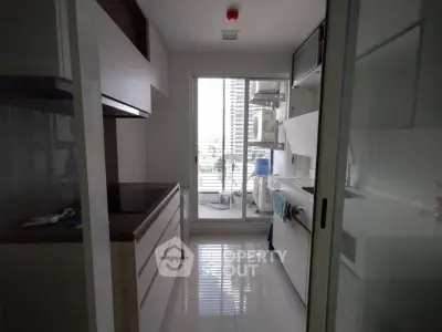 Modern kitchen with sleek cabinetry and bright natural light