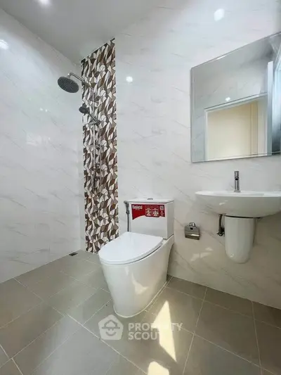 Modern bathroom with sleek fixtures and stylish tile design