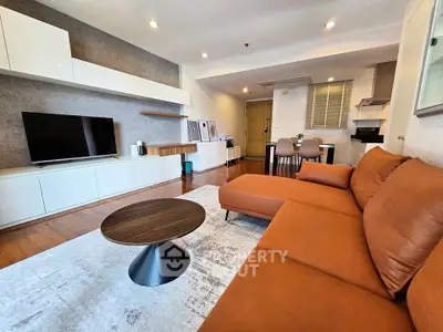 Spacious modern living room with stylish furniture and open layout