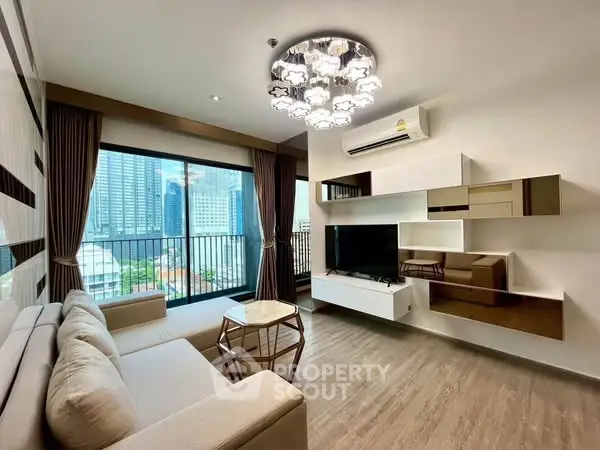 Modern living room with city view, stylish lighting, and sleek furniture in high-rise apartment.
