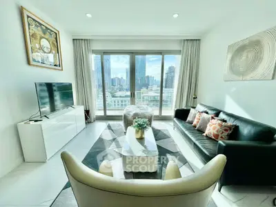 Modern living room with city view, stylish furniture, and large windows for natural light.