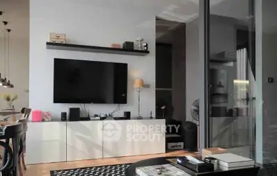 Modern living room with sleek TV setup and stylish decor