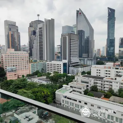 Stunning cityscape view with modern skyscrapers and lush greenery, perfect for urban living enthusiasts.