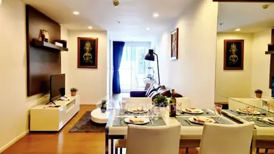 Modern living room with elegant dining area and stylish decor