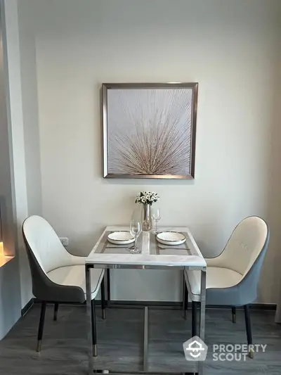 Elegant dining nook with modern decor and stylish chairs