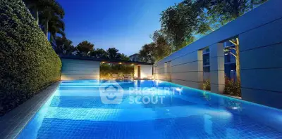Luxurious outdoor pool with ambient lighting and lush greenery, perfect for relaxation and leisure.
