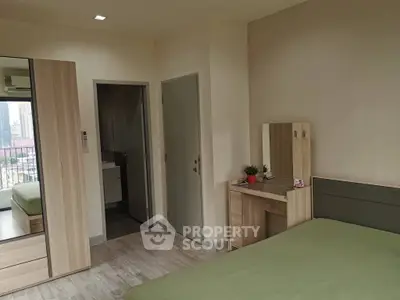 Modern bedroom with balcony view in urban apartment