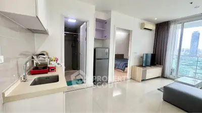 Modern apartment with open kitchen and city view balcony